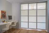 AFTER - Son's study area and activity room separate using 3 frosted glass retractable panels.