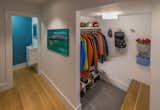 AFTER - Mudroom with sitdown bench, shoe storage, coats, and gear on the go.