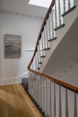 AFTER - Stair to third level with skylight above. Painting by Lisa Finch.