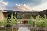 Exterior, Glass Siding Material, Stone Siding Material, Wood Siding Material, House Building Type, Metal Siding Material, and Flat RoofLine  Photo 1 of 21 in ASPEN | MOUNTAIN HOUSE by RO  |  ROCKETT DESIGN