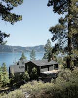 Exterior, Wood Siding Material, Concrete Siding Material, Boathouse Building Type, Stone Siding Material, Farmhouse Building Type, House Building Type, Metal Siding Material, Cabin Building Type, Metal Roof Material, Gable RoofLine, and Glass Siding Material  Photo 3 of 20 in LAKE TAHOE | CABIN(S) by RO  |  ROCKETT DESIGN