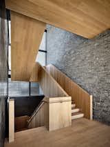 Staircase, Wood Tread, Metal Railing, Wood Railing, and Stone Tread  Photo 8 of 20 in ASPEN | HORIZON HOUSE by RO  |  ROCKETT DESIGN