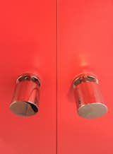 Red doors with chrome doorknobs