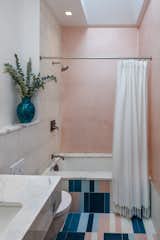 Bath Room, Ceiling Lighting, Recessed Lighting, Marble Counter, One Piece Toilet, Concrete Wall, Open Shower, Cement Tile Floor, Undermount Tub, and Undermount Sink Pink and white tadelakt bathroom  Photo 16 of 25 in Nomadic Nest by Andrew Mikhael Architect