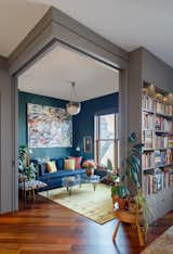 Living room with corner pocket doors