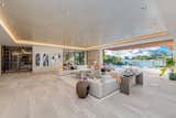 The home's living room is spans 40 feet wide.  Photo 5 of 18 in North Bay Road Residence by Choeff Levy Fischman
