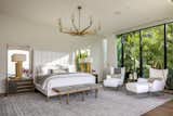 Facing northwest, the master bedroom allows an abundance of natural light to shine through. 
