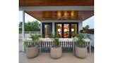 Outdoor entertaining space on the second floor roof.  Photo 2 of 17 in Artistically Modern by NSPJ Architects