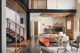 The long hallway from the kitchen to the master bedroom is often used as a racetrack for scooters or cardboard box bobsledding. The exposed steel support beams are at the heart of the home, and the project's design.  Photo 7 of 7 in Favorites by Jinwoo Chung from 1600 Lakeside
