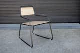 The infinite loop of the South Chair explores negative space without compromising durability or strength