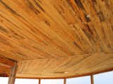 New Mexico ponderosa pine T&G ceiling installed before the strawbale walls were put up  Photo 8 of 28 in Picture Rock Studio-Round Strawbale Home design & built by Glen Neff by Glen Neff