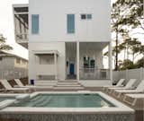 The east side of the home features a large swimming pool and outdoor deck. 
