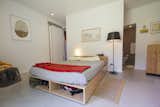 Note the concrete floors and another disappearing door leading to the living room