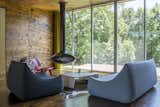 The Living Room features a Fireorb and views out to the rear of the property