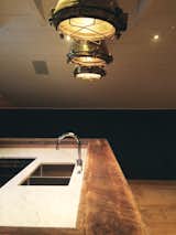 Marble work top and oak timber bar top.  Vintage Brass Nautical Lighting.  