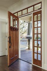 Door 36803 with a 9541 dentil shelf, custom sidelights, and a 37755 transom, shown in fir. 