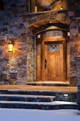 California Poppy® II 6962 with UltraBlock® technology and optional angled, 6181 sidelights and custom transom, shown in knotty alder.  Photo 1 of 12 in Craftsman Collection by Simpson Door Company