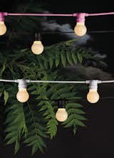 Though these rubber outdoor string lights by Seletti are no longer available, they may provide some inspiration for figuring out a similar effect in your outdoor space.