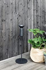 Inspired by a field of tall poppies, these outdoor oil lamps by Northern Lighting were crafted in a shape that captures the flowers’ elegant stems and the crowns.  Photo 9 of 10 in 9 Ways to Create the Perfect Outdoor Lighting
