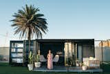 Australia-based firm Contained specializes in transforming cargo vessels into well-designed lodgings. Each 20-foot shipping container easily opens up, flips out, and unfolds into a luxurious hotel room.
