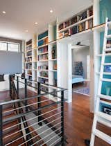 Bookcase/stairs  Photo 11 of 11 in Balcones Drive Residence by Texas Construction Company