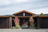The property is clad in locally milled Douglas Fir siding and topped with a rusted corrugated metal roof. Both materials were weathered by the clients.&nbsp;