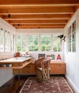 Agate Pass Cabin | The former porch was transformed into an office and dining room.