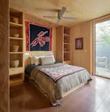 The second bedroom is located in a separate wing that also houses storage space.&nbsp;