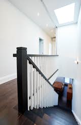 Staircase, Wood Tread, and Wood Railing Pape Village House - Stairs  Photo 1 of 10 in Pape Village by Solares Architecture