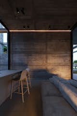 
A perfect blend of minimalist design and industrial elements, with exposed concrete and soft lighting creating a warm, modern atmosphere. #mb3h #industrialdesign #minimalism #modernliving
