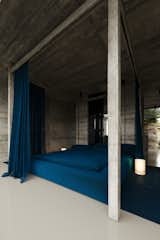 A perfect blend of modern industrial design and rich textures, offering a serene and sophisticated bedroom retreat. #mb3h #modernbedroom #concreteinteriors #minimalistdecor