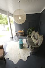 Covered Porch with modern fixtures   Photo 14 of 16 in Historic Bungalow by LeavittHaas