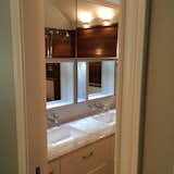 Updated Master Bath with Robern Mirrors to maximize storage.