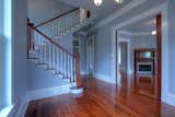 Restored grand staircase with 4 distinct historic newel posts