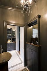Additional Storage - The old door to the powder room was moved to the remodeled kitchen - and the old doorway was utilized to add additional storage to the Powder room without impinging on floor space in the 4 x 6 space.