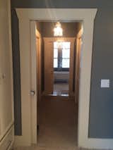 The entrance to the new ensuite incorporated pocket doors to maximize floor space.  2 new closets with french pocket doors created a dressing area for the homeowners who previously had 2 small closets flanking the windows in the bedroom.