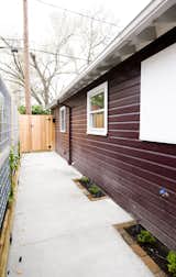 A new patio was built for more exterior space for the homeowner and their renters.  Hardscaping and landscaping were installed with an eye towards maintenance.