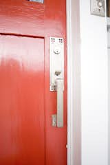 New door hardware with accents that mimicked the mailbox screen kept a flow to the home.