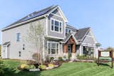 DJK Custom Homes New Parker II Eco-Smart Model Home features Solar Panels, Velux Skylights and Suntunnels, Garden Rain Chain, Drought Tolerant Grass, Native Drought Tolerant Landscaping, and Rain Barrel. 
