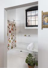 Shower room with tub and J Schatz Speckled Stoneware Tiles