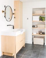 Master Bath renovation. His & Hers vanities. Custom cabinetry (Cronin Cabinetry). Custom integrated vanity and sink (LA Tiles). Sconces: Mitzi. Decor & accessories: Sage Market + Design. Interior Designer: Sage Market + Design. Builder: Head Above Builders.