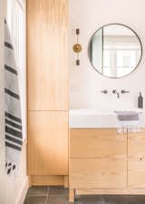Master Bath renovation. His & Hers vanities. Custom cabinetry (Cronin Cabinetry). Custom integrated vanity and sink (LA Tiles). Sconces: Mitzi. Decor & accessories: Sage Market + Design. Interior Designer: Sage Market + Design. Builder: Head Above Builders.