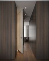 Hallway and Dark Hardwood Floor  Photo 12 of 13 in Enigma by BEZMIRNO