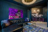 The den features original artwork of Jimi Hendrix and bespoke wallcovering of Paul Stanley.