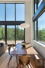 Dining Room, Pendant Lighting, Light Hardwood Floor, Table, Chair, and Bench  Photo 10 of 18 in Mountain Retreat by Catherine Truman Architects