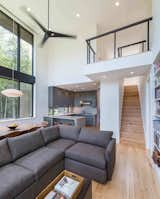 Living Room, Light Hardwood Floor, Recessed Lighting, Sectional, and Coffee Tables  Photo 11 of 18 in Mountain Retreat by Catherine Truman Architects