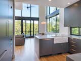 Kitchen, Colorful Cabinet, Drop In Sink, Light Hardwood Floor, and Recessed Lighting  Photo 12 of 18 in Mountain Retreat by Catherine Truman Architects