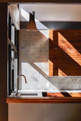 Kitchen, Undermount, Wood, Engineered Quartz, Wood, Ceramic Tile, Light Hardwood, and Pendant  Kitchen Wood Ceramic Tile Light Hardwood Pendant Photos from House  //  TW