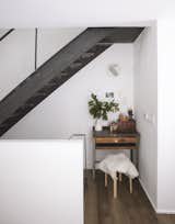"Some of my favorite spaces are those that weren't even necessarily planned," says Shahane. "For instance, underneath the stair on the first floor it ended up being a few inches deeper than initially planned because of plumbing requirements. But those inches made a perfect and impromptu alcove for our daughter's drawing table."
