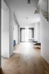 A Family’s Loft in Poland Gets a Minimalist Renovation That’s Both Elegant and Functional - Photo 3 of 12 - 